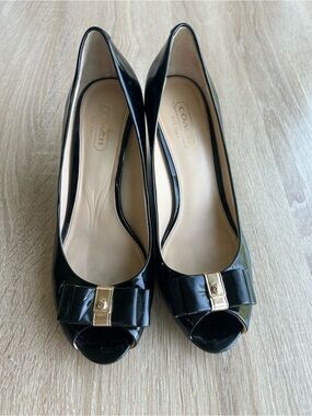 Coach Women's Black Patent Leather Peep-Toe Wedge with Gold Accent